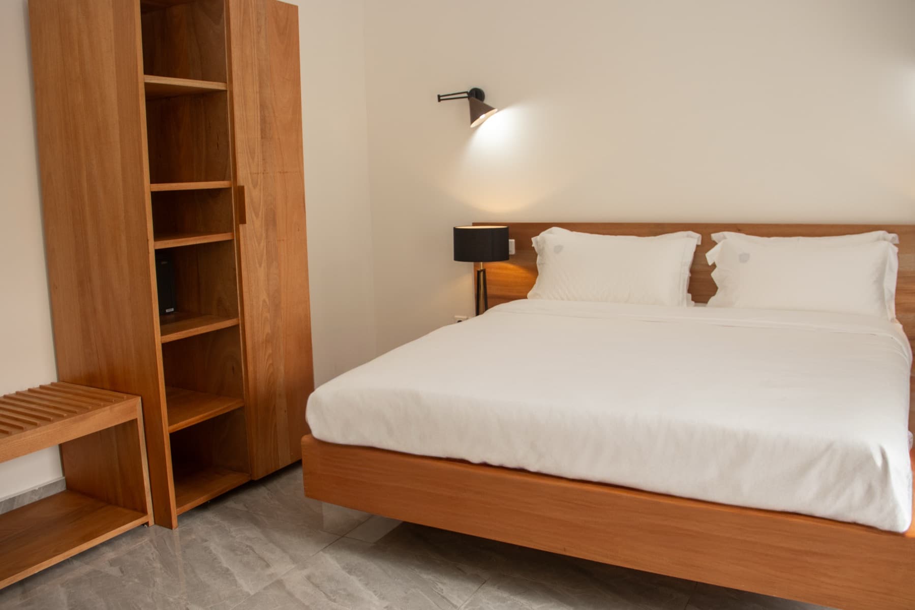 Chambre Deluxe de la Résidence Feuille, hôtel élégant à Pointe-Noire
